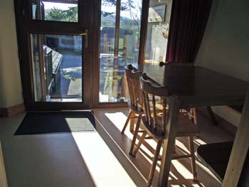 dining area and view through porch