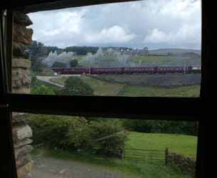 A West Coast  Main line steam express seen from the living room